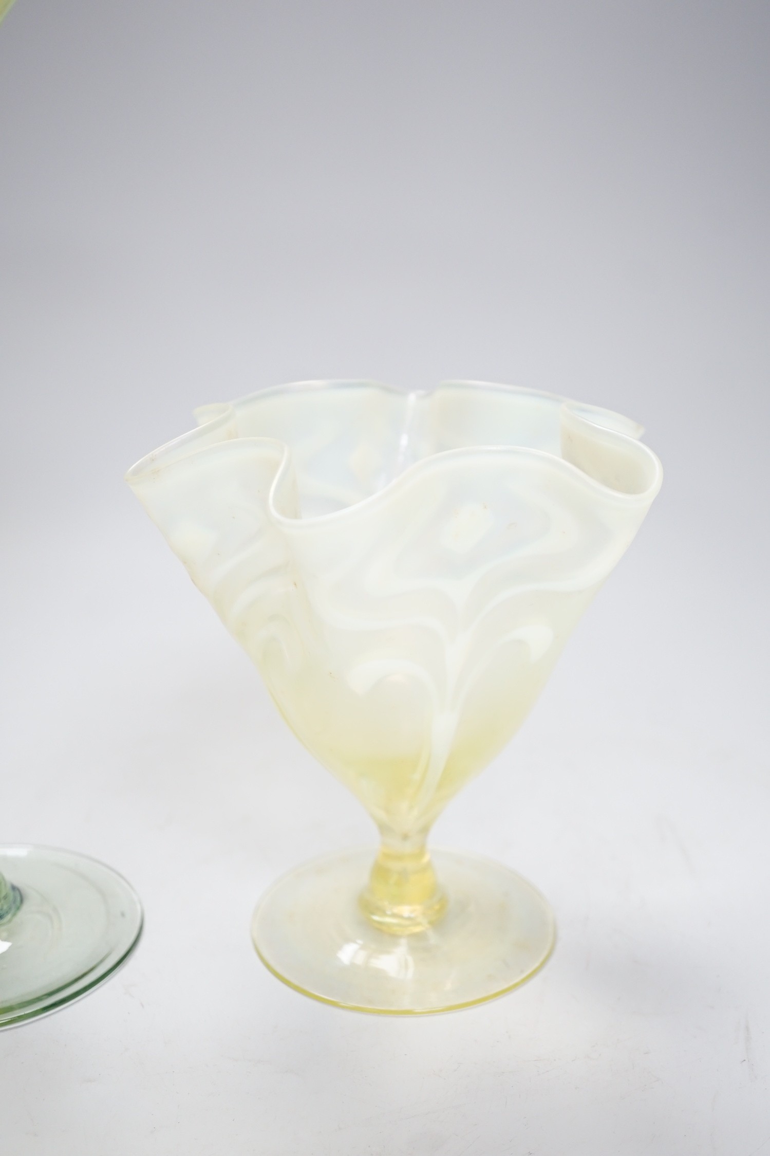 Two early 20th century vaseline glass vases, tallest 29cm